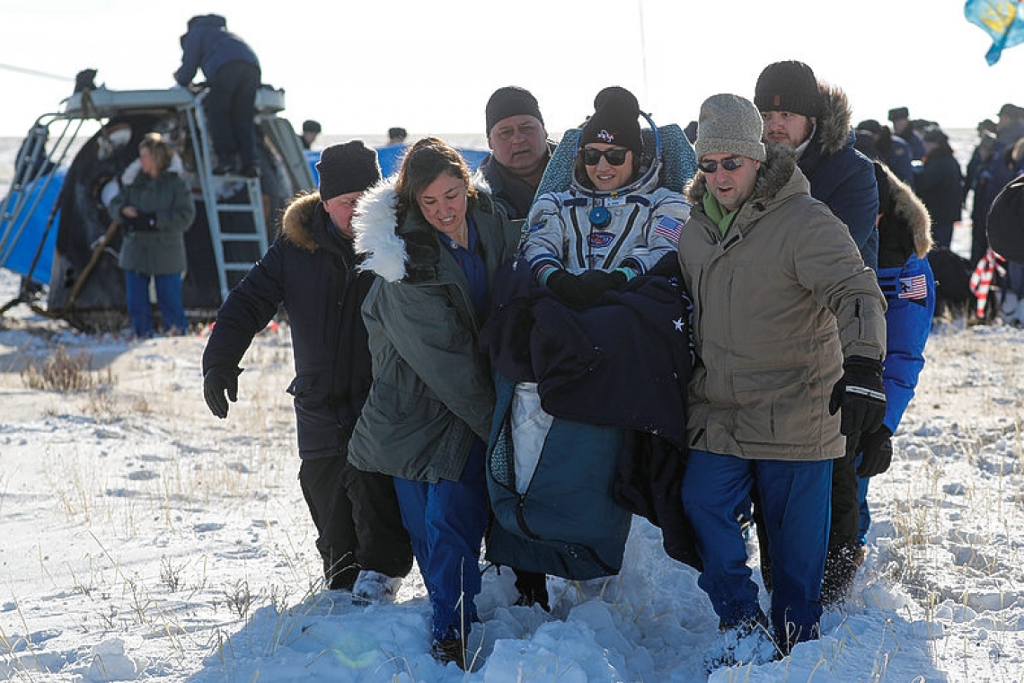 NASA astronaut Koch returns to Earth after record mission